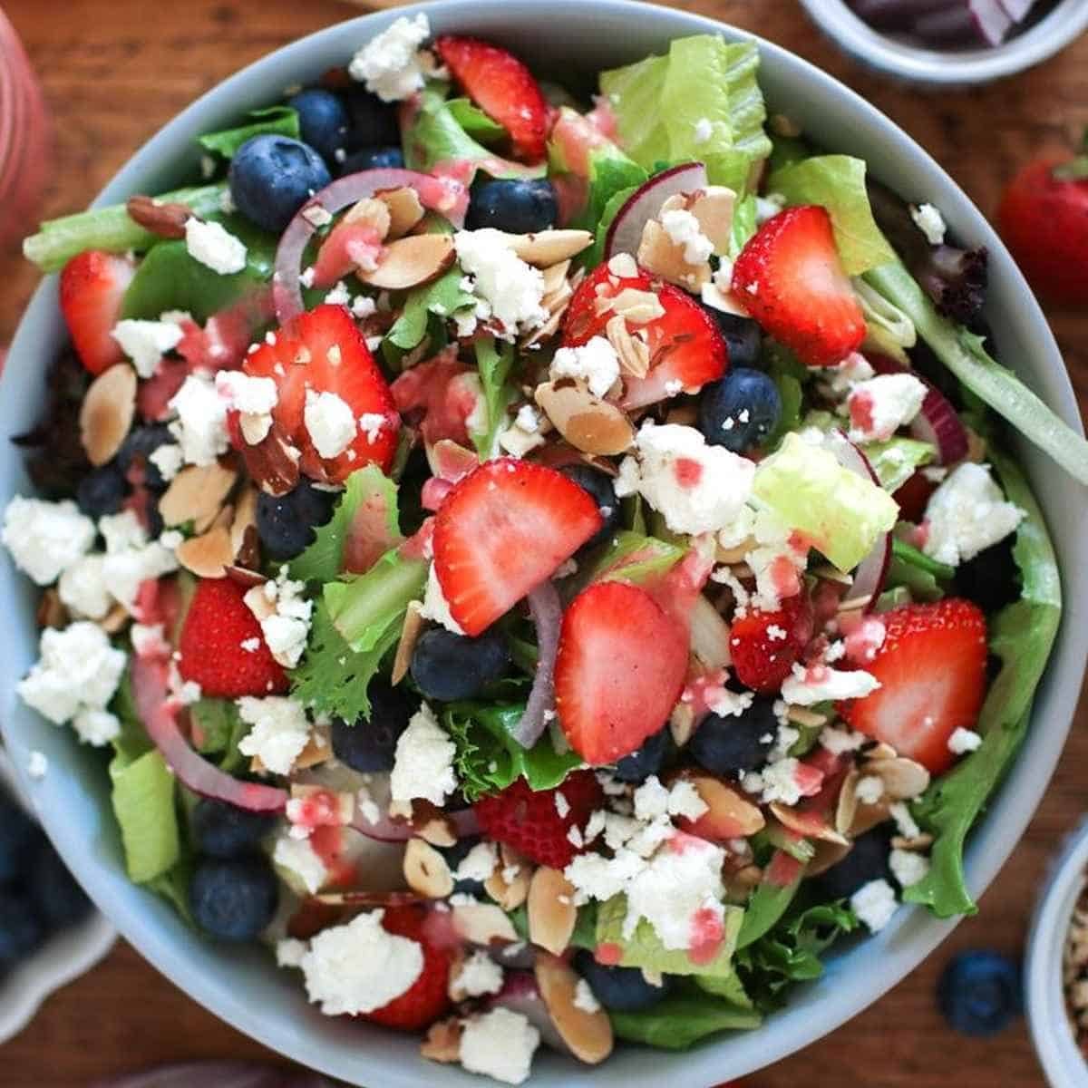 Berry salad with strawberries, blueberries, feta, and almonds